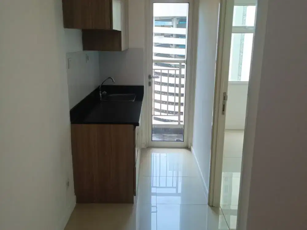 1BR Unfurnished Apartemen Madison Park - Mall Central Park