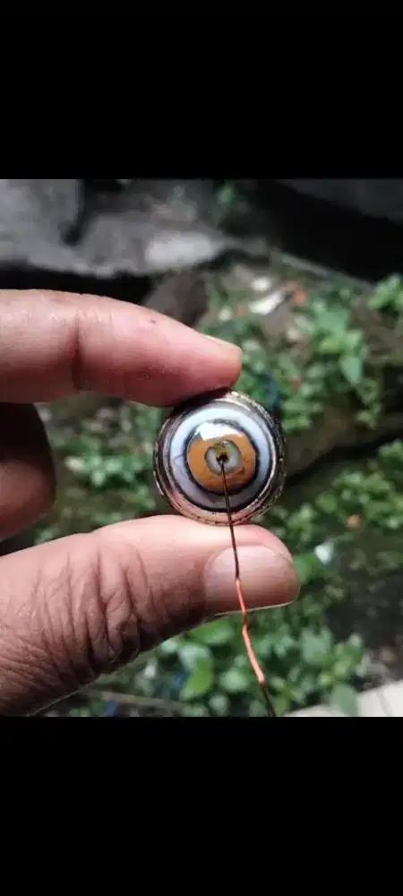 Batu Puser bumi combong satu rambut