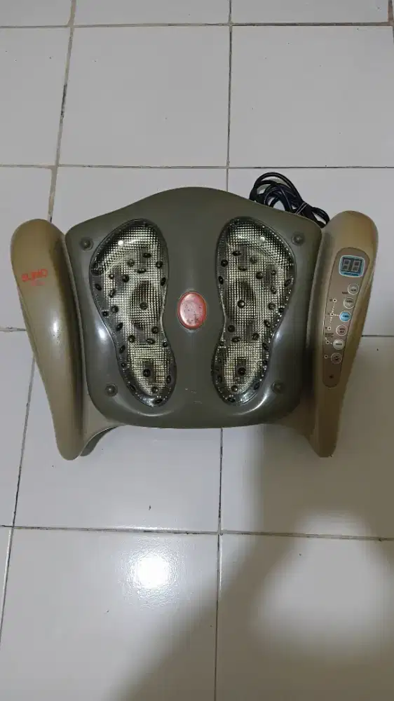 Alat pijat therapy elektrik