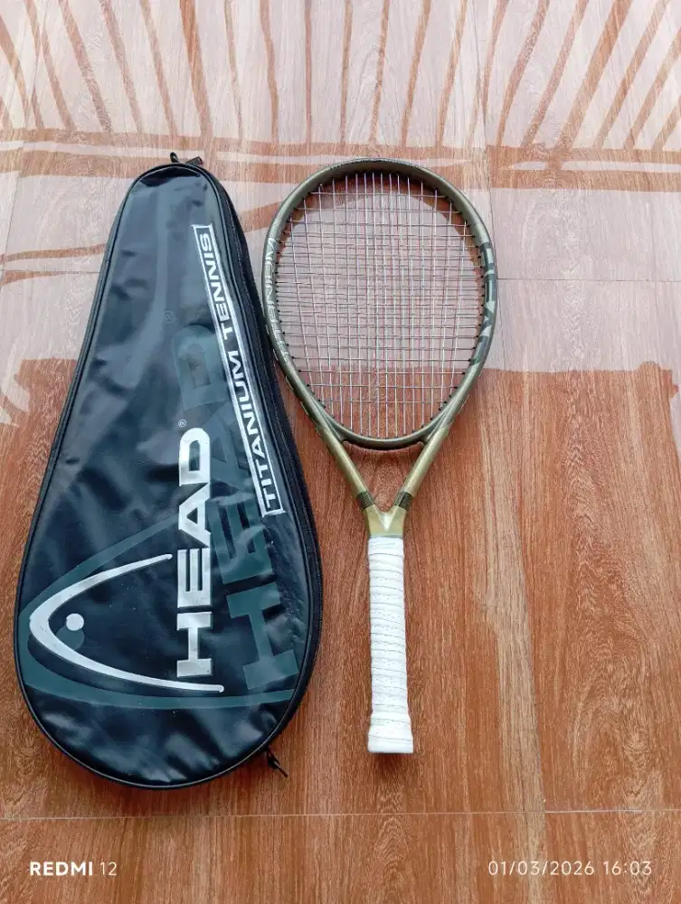 Raket tenis head