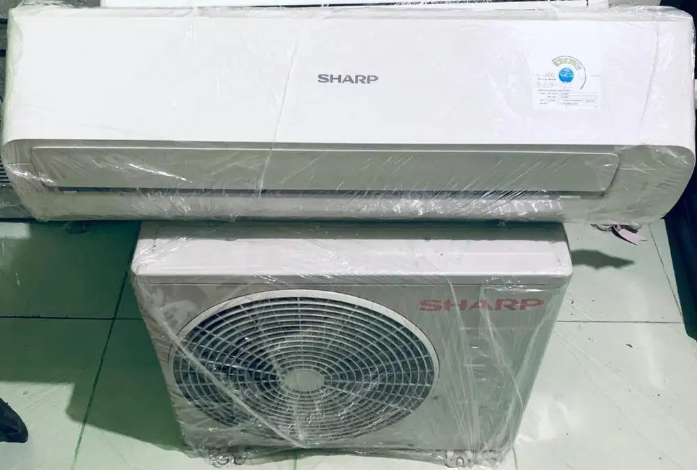AC SHARP 1/2 PK BARU 8 BULAN