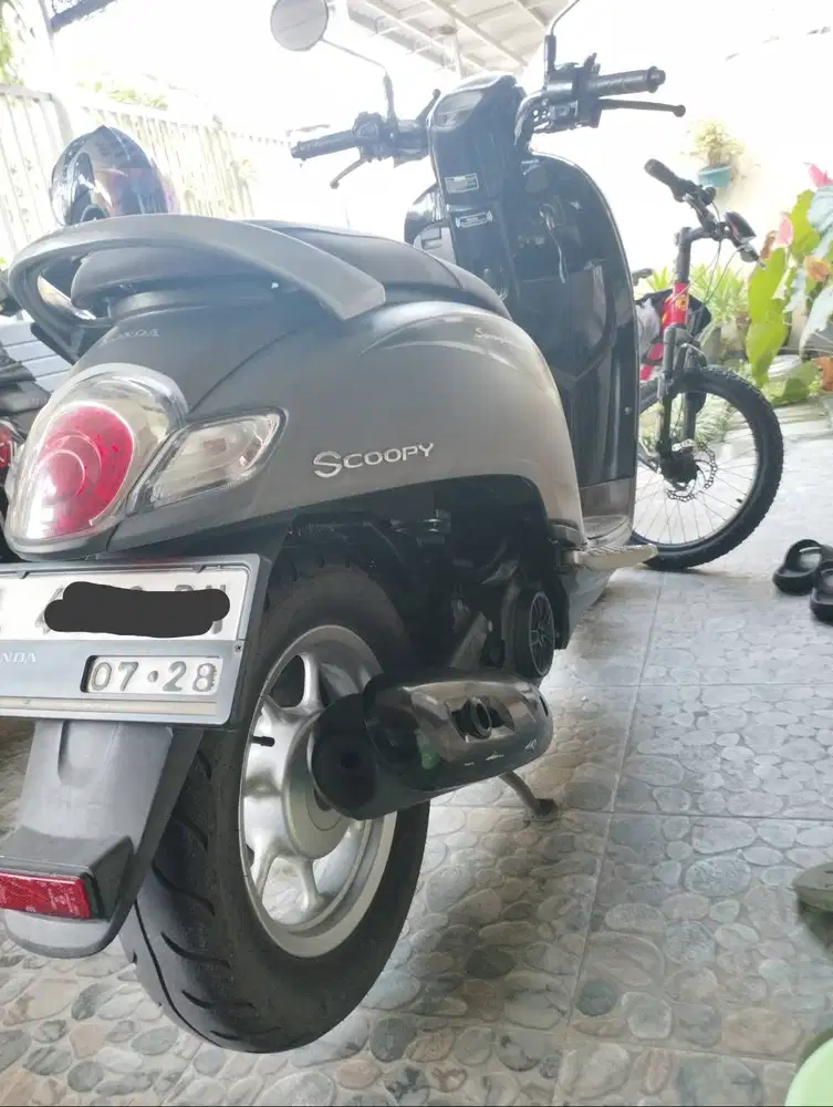 scoopy KM rendah