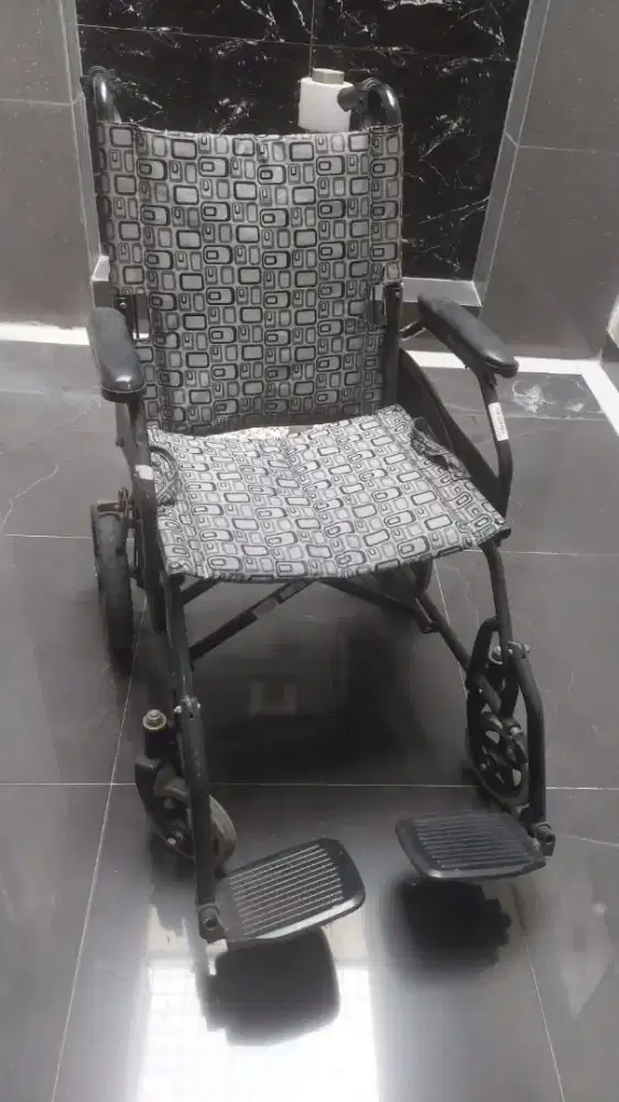 Kursi roda travelling