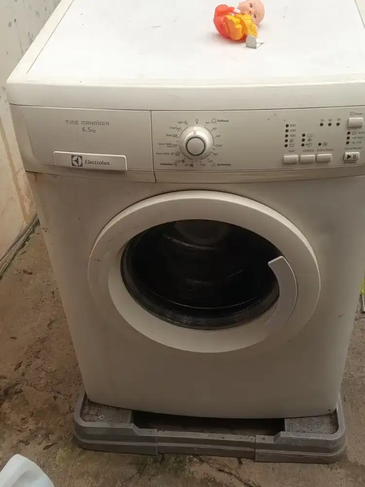 Mesin cuci electrolux tidak bisa buka pintu