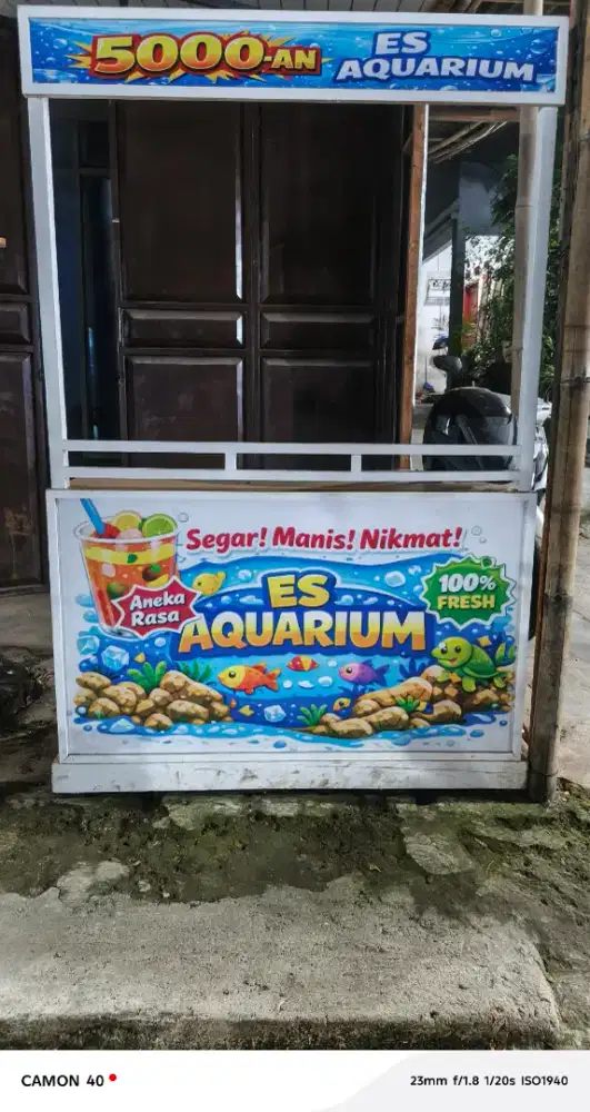 Gerobak jualan es akuarium