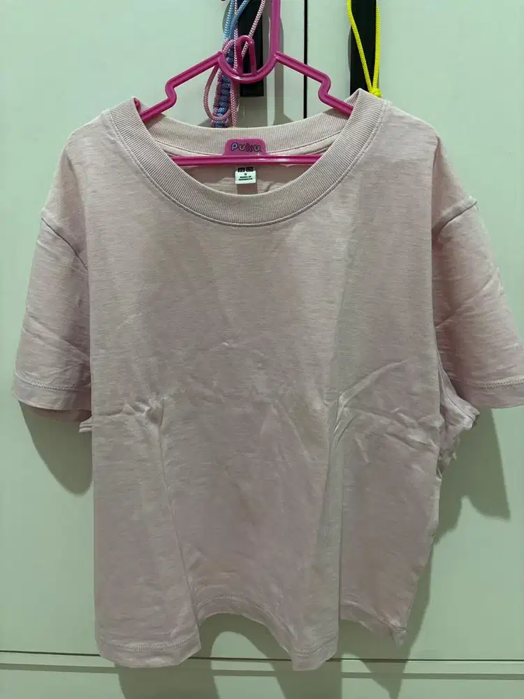 Kaos pink polos uniqlo