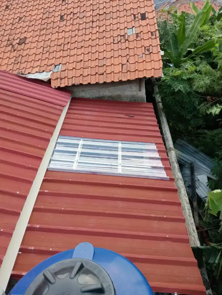 Renovasi atap rumah bongkar atap lama ganti bajaringan