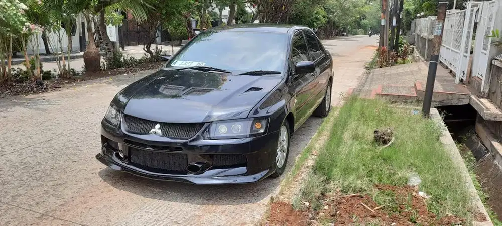 Part modifikasi evo 9 bahan fiber kap mesin bemper fender lampu