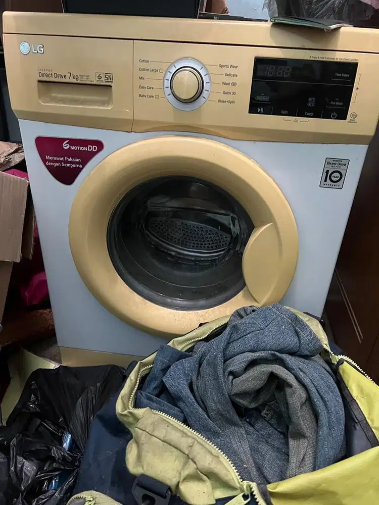 Mesin cuci LG bukaan depan rusak