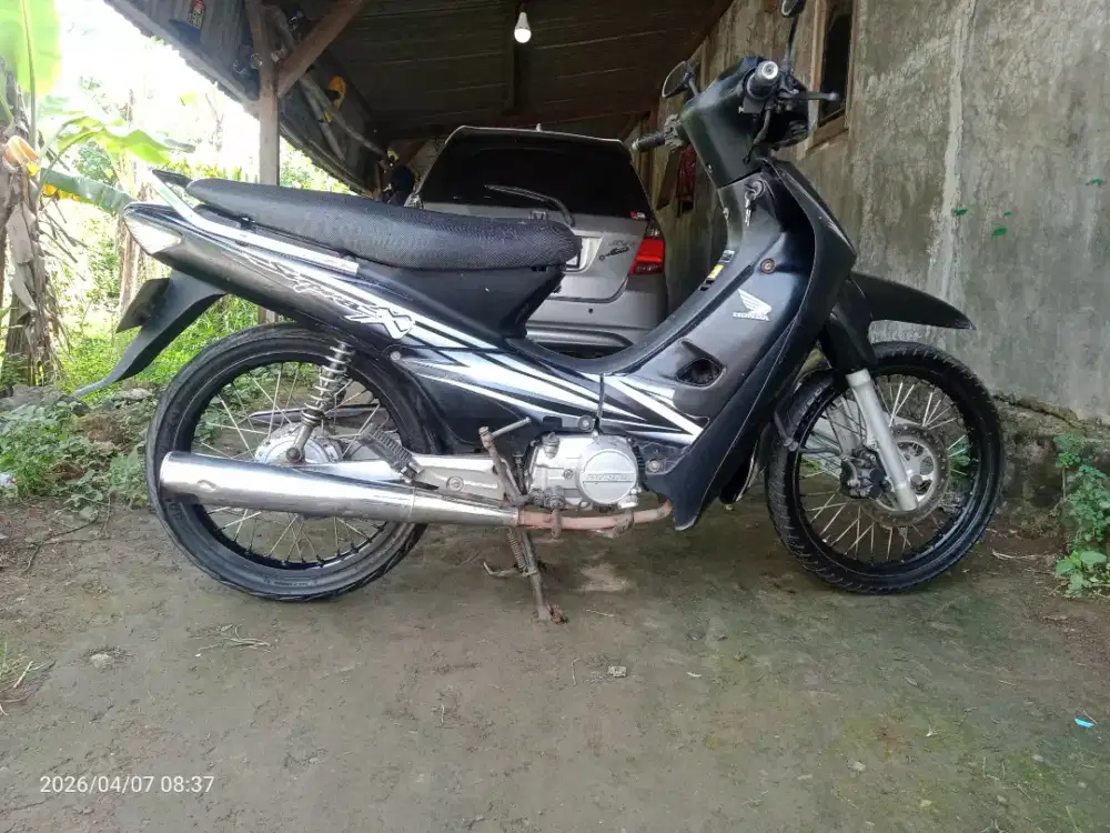 Supra x 100 tahun 2004