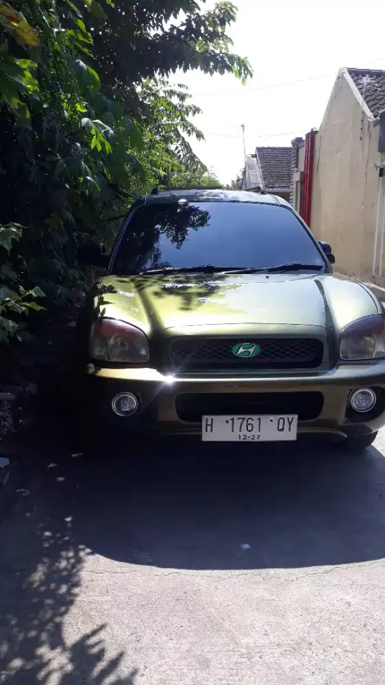 Santa fe generasi 1 tahun emas