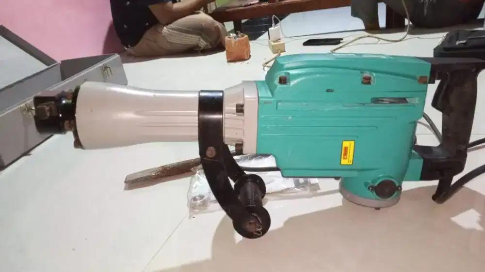 Jack hammer , merk dca kondisi bekas seperti baru