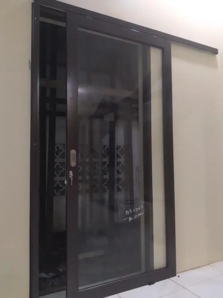 Pintu geser aluminium T210cm L90cm harga terpasang 2,3 jt/ unit