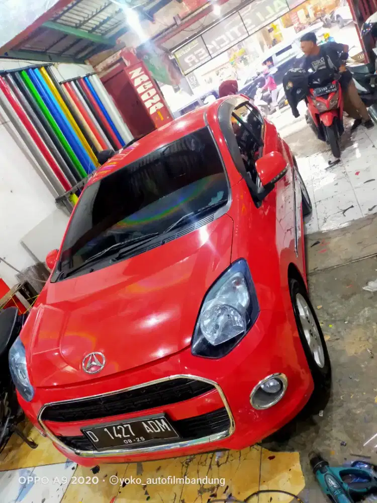 Pasang kaca film cover jok wrapping sticker panggilan murmer