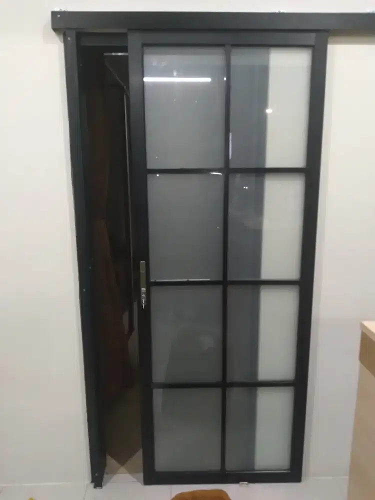Pintu geser alumunium ornamen T210cm L90cm harga terpasang 2,45 jt/pcs