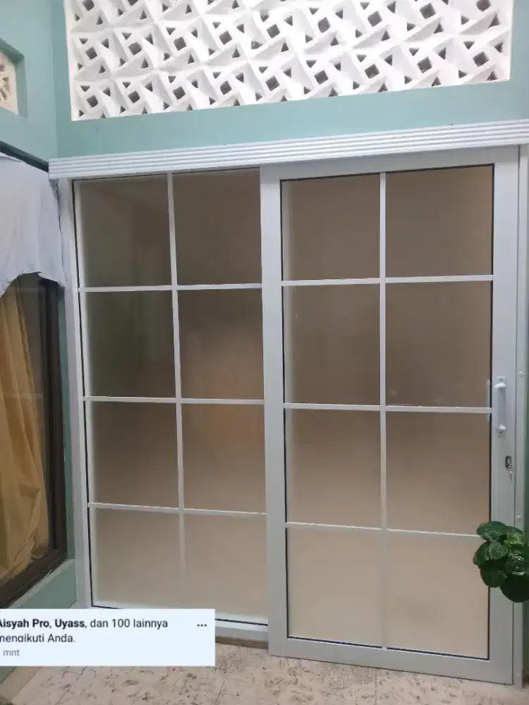 Pintu aluminium geser ornamen 2 daun T210cm L200cm hrg plus psg 4,1 jt