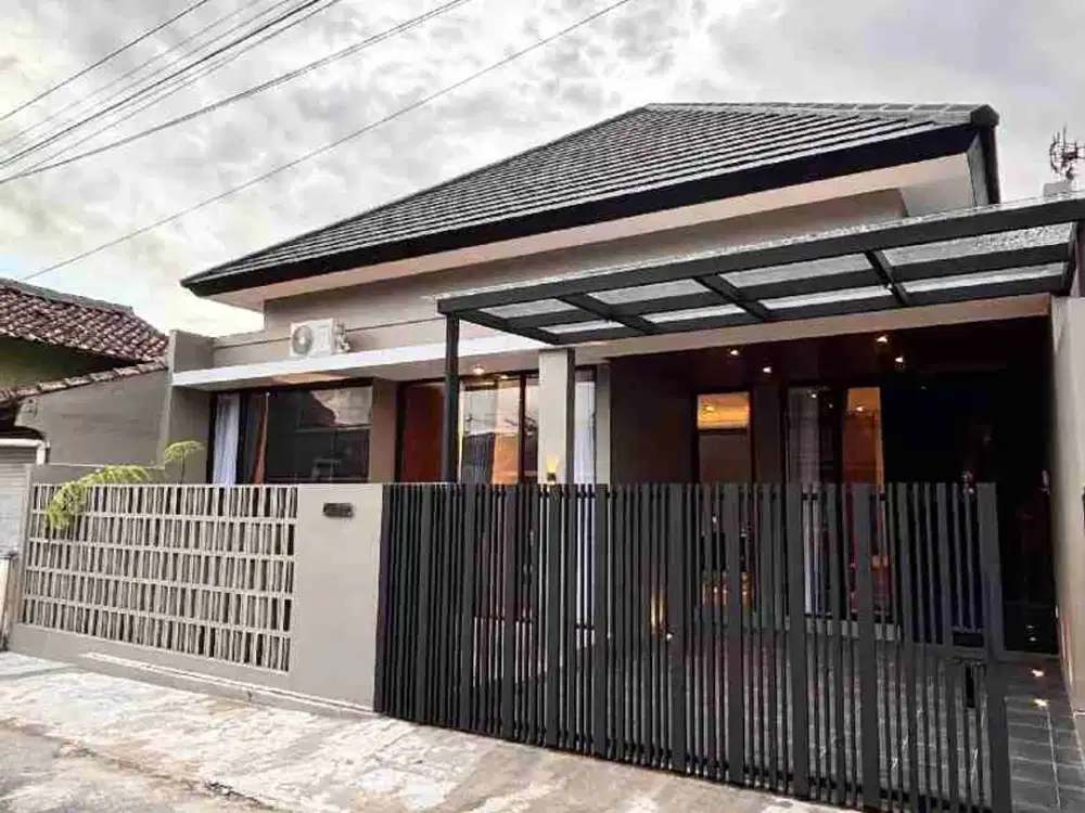 Rumah Tropis Modern  Di Jalan Kaliurang Km 13 Dekat Kampus UII