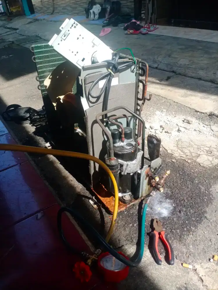 SERVICE DAN CUCI AC mesin cuci