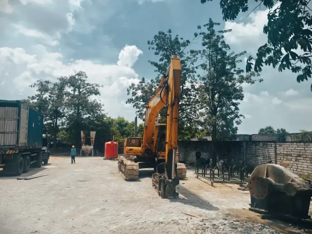 Jasa bongkar dan perataan bangunan