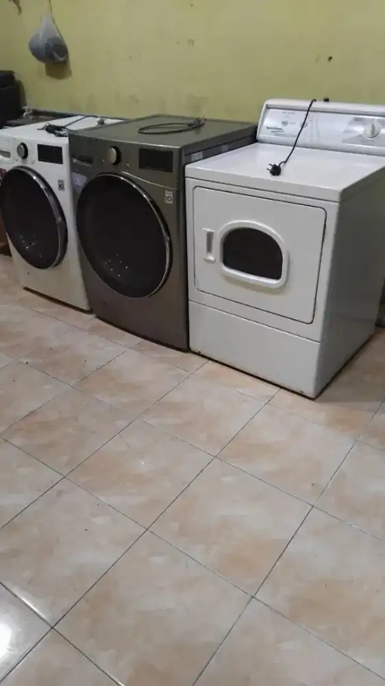 Menerima mesin cuci rusak bekas londry