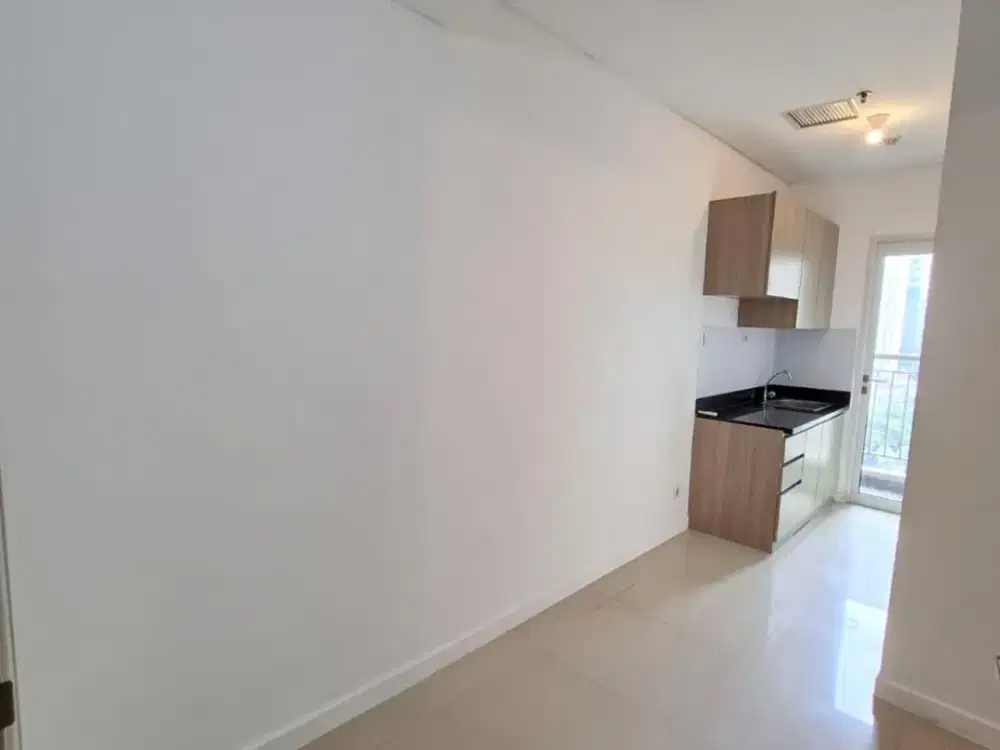 1BR Unfurnished Apartemen Madison Park - Mall Central Park