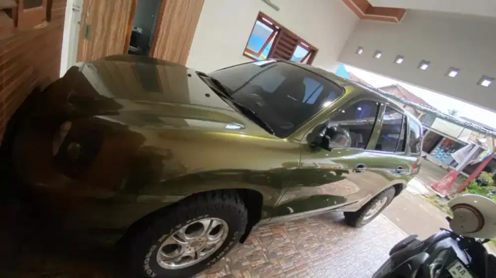 Santa fe generasi 1 tahun emas