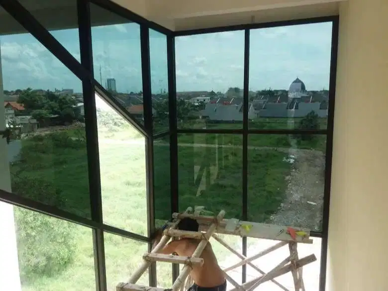 kaca film kantor kacafilm rumah sticker gedung Stiker Oneway Cutting