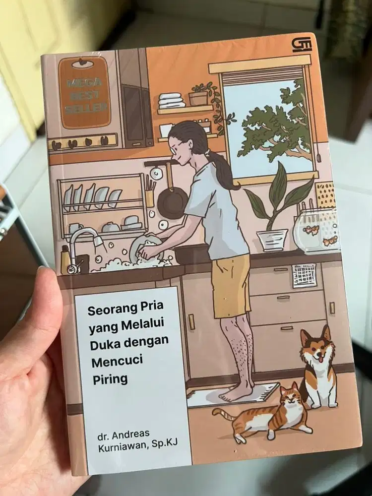 Buku Seorang pria yang melalui duka dengan mencuci piring