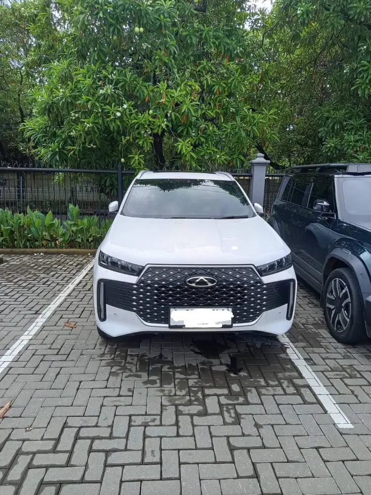 tiggo cross premium a/t putih 2025