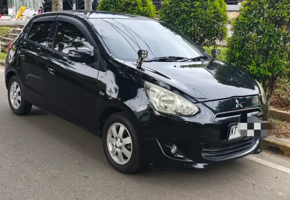 Mirage Exceed 1.2 L Tahun 2015