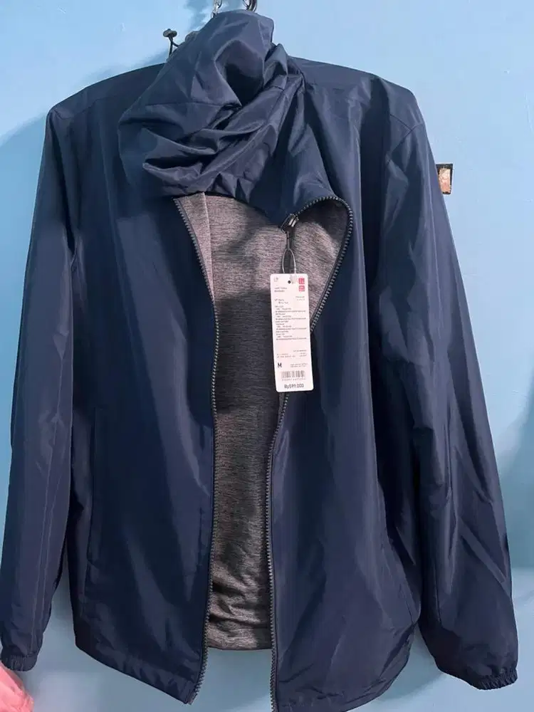 Sweter parasut merk uniqlo