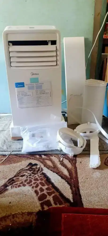 AC PORTABEL 1 PK MEREK MIDEA