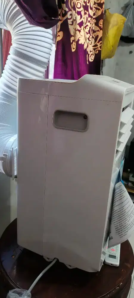 Ac portable Midea setengah PK