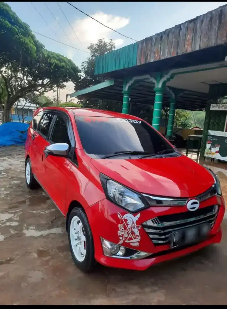 Sigra R Deluxe 1,2 MT