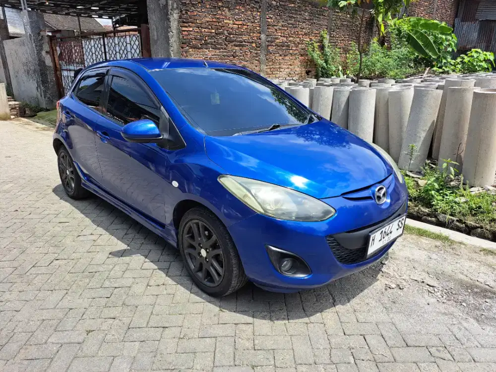 Mazda 2 2011 manual dp 10jt aja