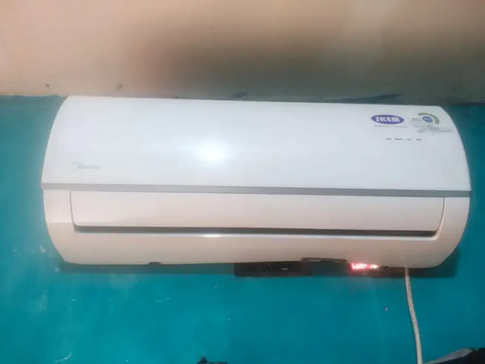 Jual AC midea ½ pk