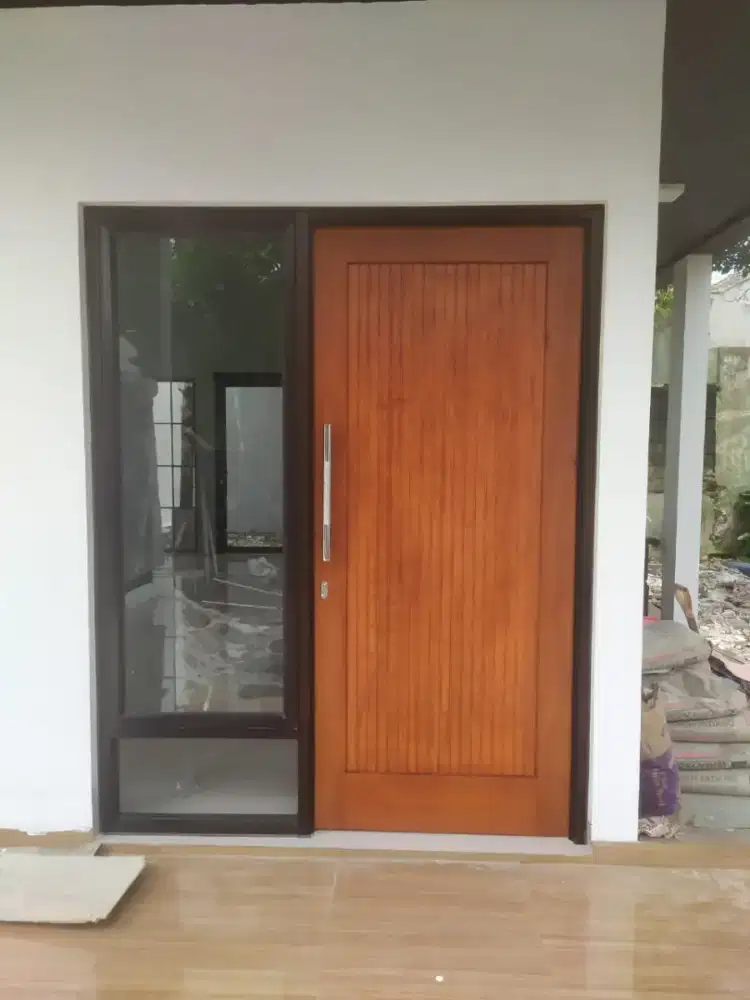 pintu utama kusen aluminium daun pintu kayu solid Meranti fin.melamik