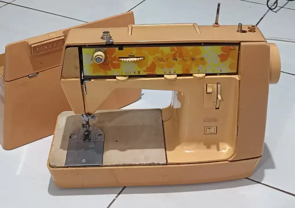 Mesin jahit portable singer