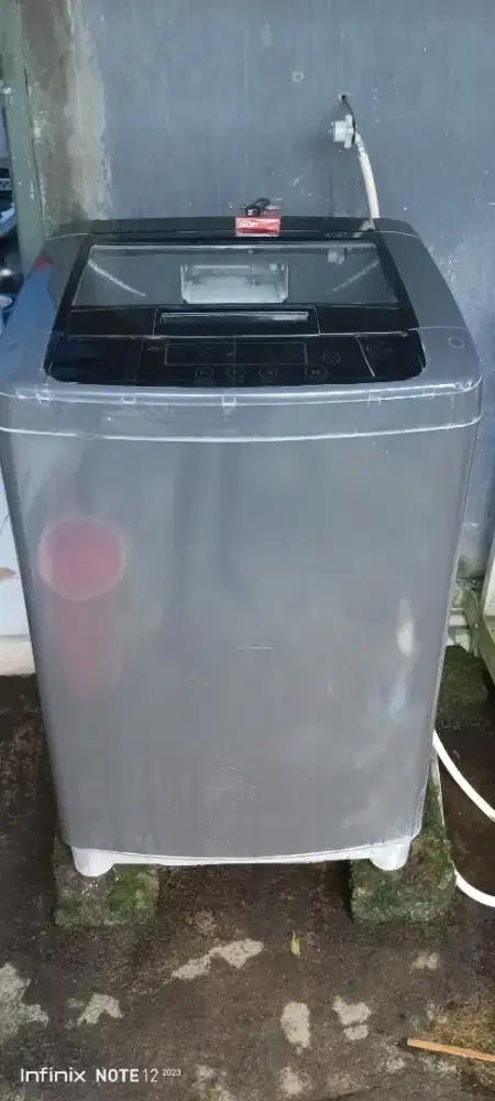 Mesin cuci otomatis merk LG 13kg