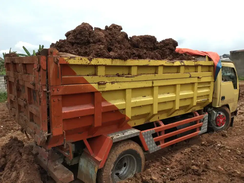 Jasa pengurugan tanah dan buang puing sampah