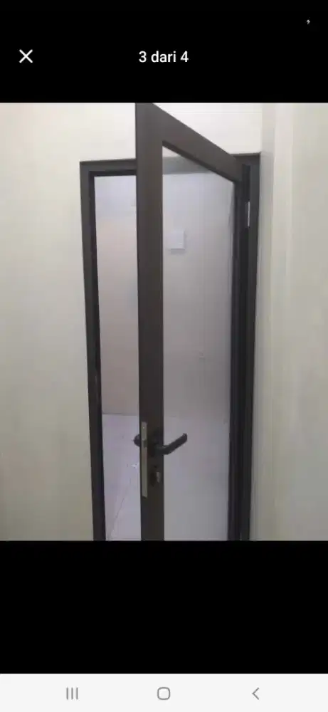 Pintu kaca aluminium swing T220cm L100cm hrg 2,1 jt / pcs terpasang