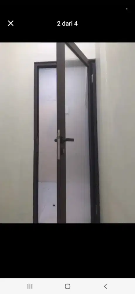 Pintu alumunium kaca swing T220cm L100cm harga terpasang 2,1 jt/unit