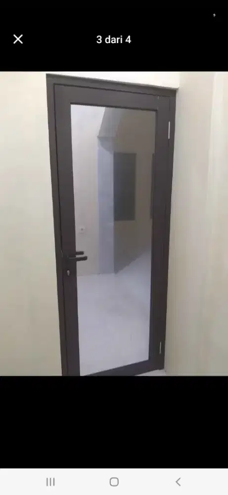 Pintu alumunium kaca swing T220cm L100cm harga 2,1 jt / unit terpasang