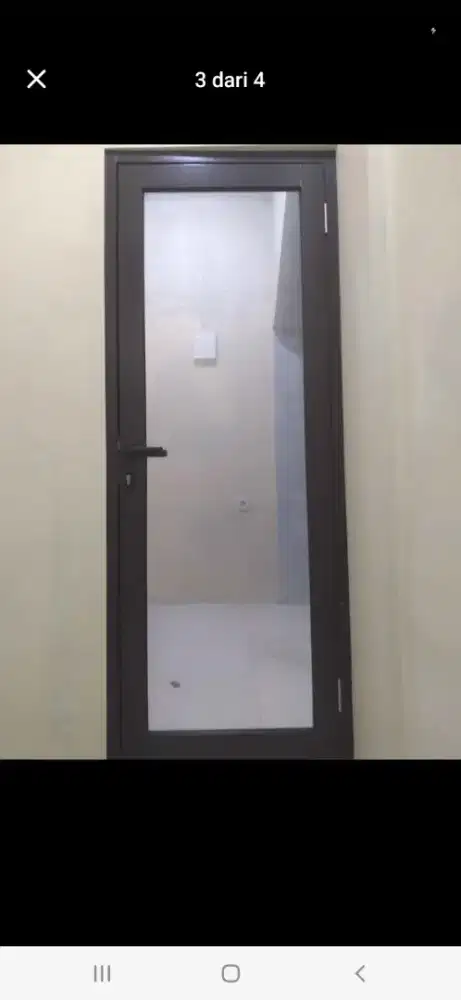 Pintu kaca aluminium swing office T220cm L100cm hrg terpasang 2,1 jt