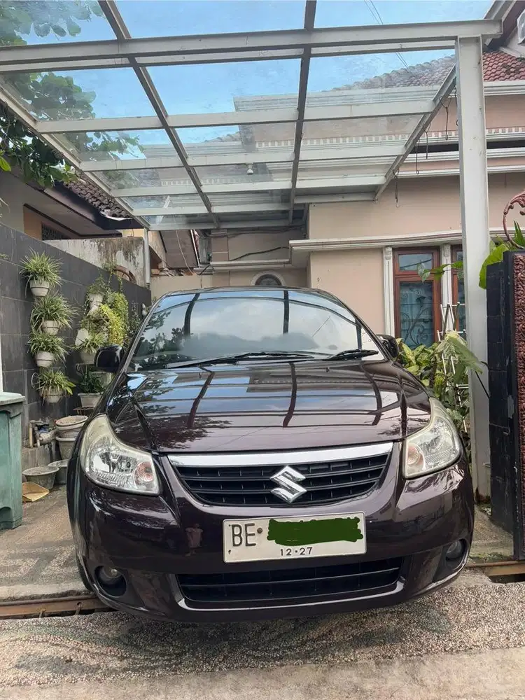 Suzuki neo baleno merah burgundy manual 2008