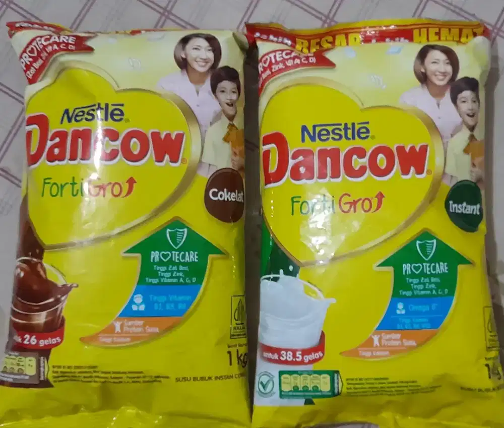 Bismillah, silahkan susu Dancow rasa coklat dan vanila 1kg