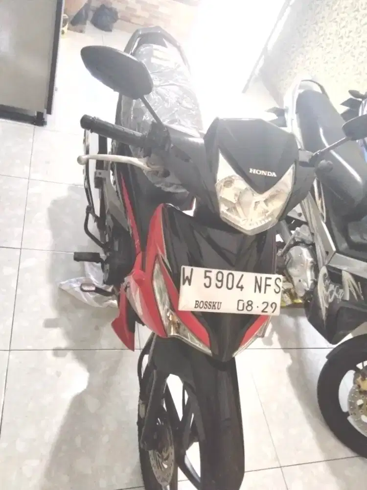Supra x 125 CC merah hitam