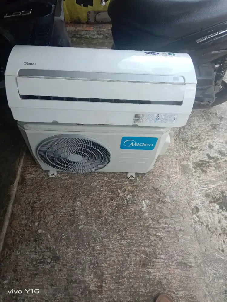 Ac midea 1/2 pk dingin