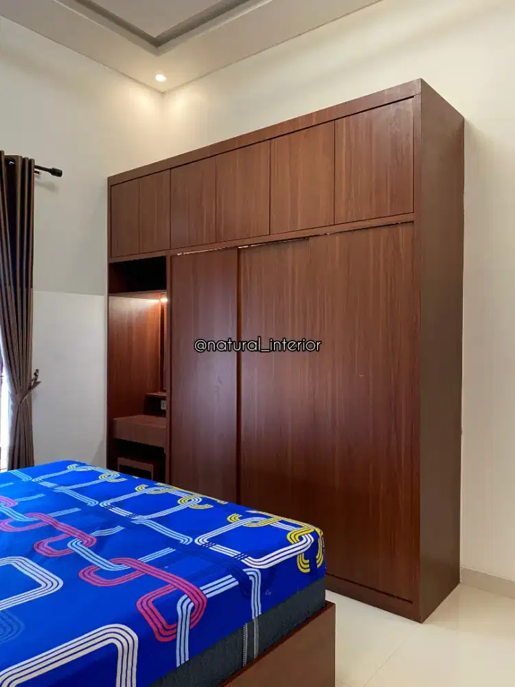 Lemari pakaian finishing HPL