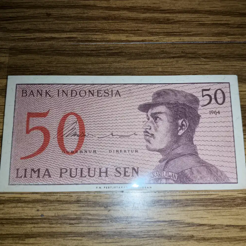 Uang kuno Indonesia 50 sen sukarelawan mulus, asli.